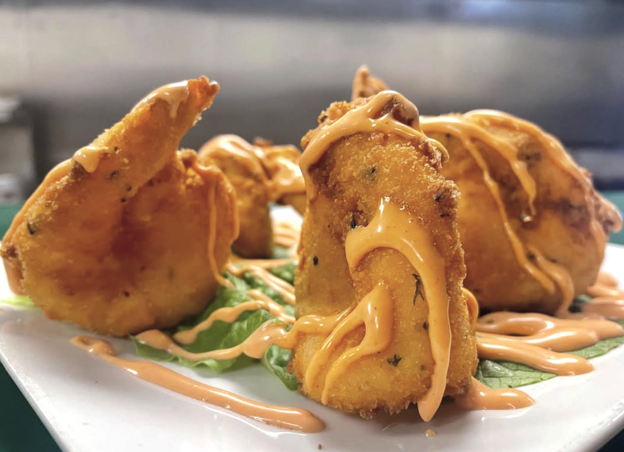 Fried appetizers with chipotle drizzle